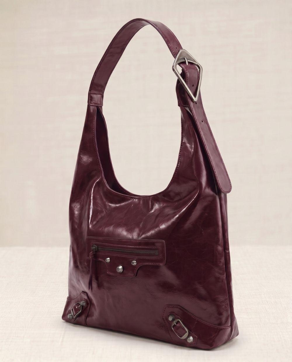 a handbag with a zipper on the front of it