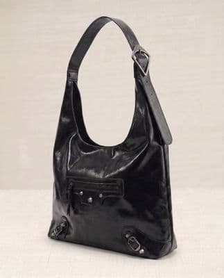 a black purse with a zipper on the front