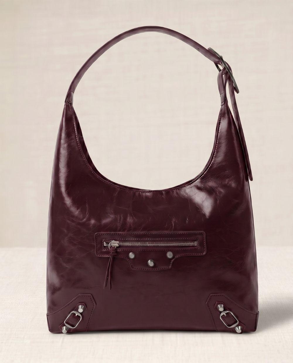 a handbag with a zipper on the front of it