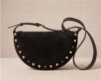 a black purse with gold studs on it