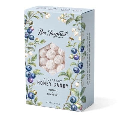 a box of blueberry honey candy on a white background
