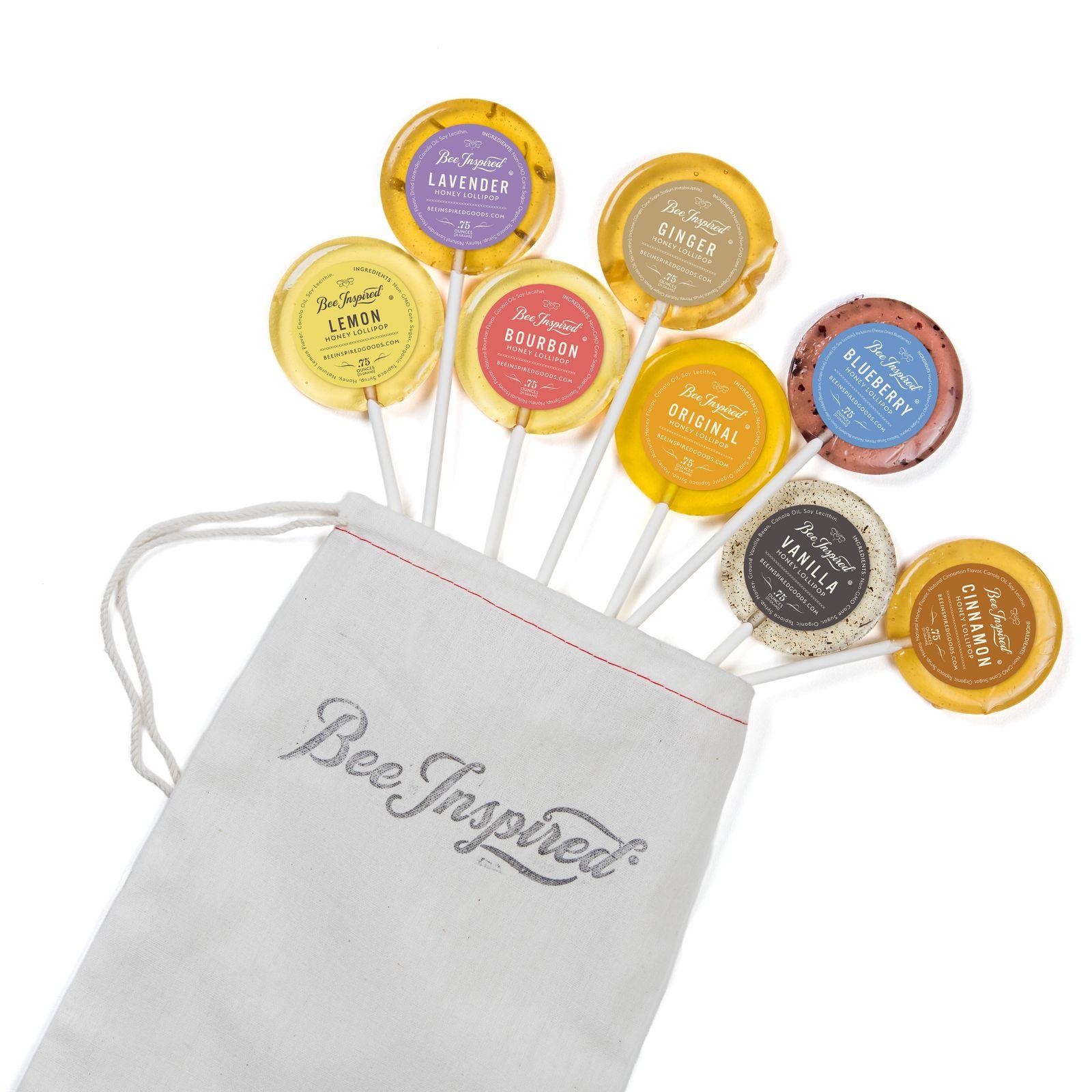 a bag filled with lollipops sitting on top of a table