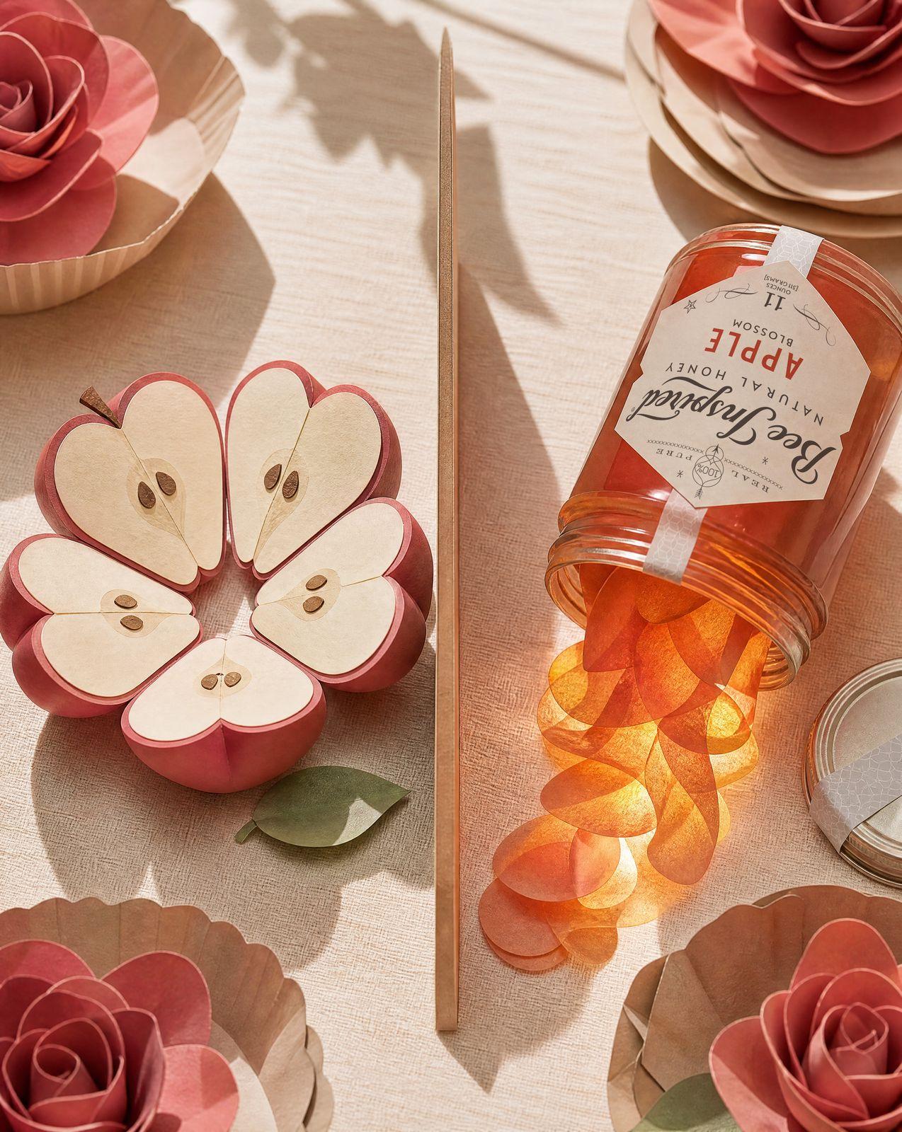 a bottle of honey sitting on top of a table