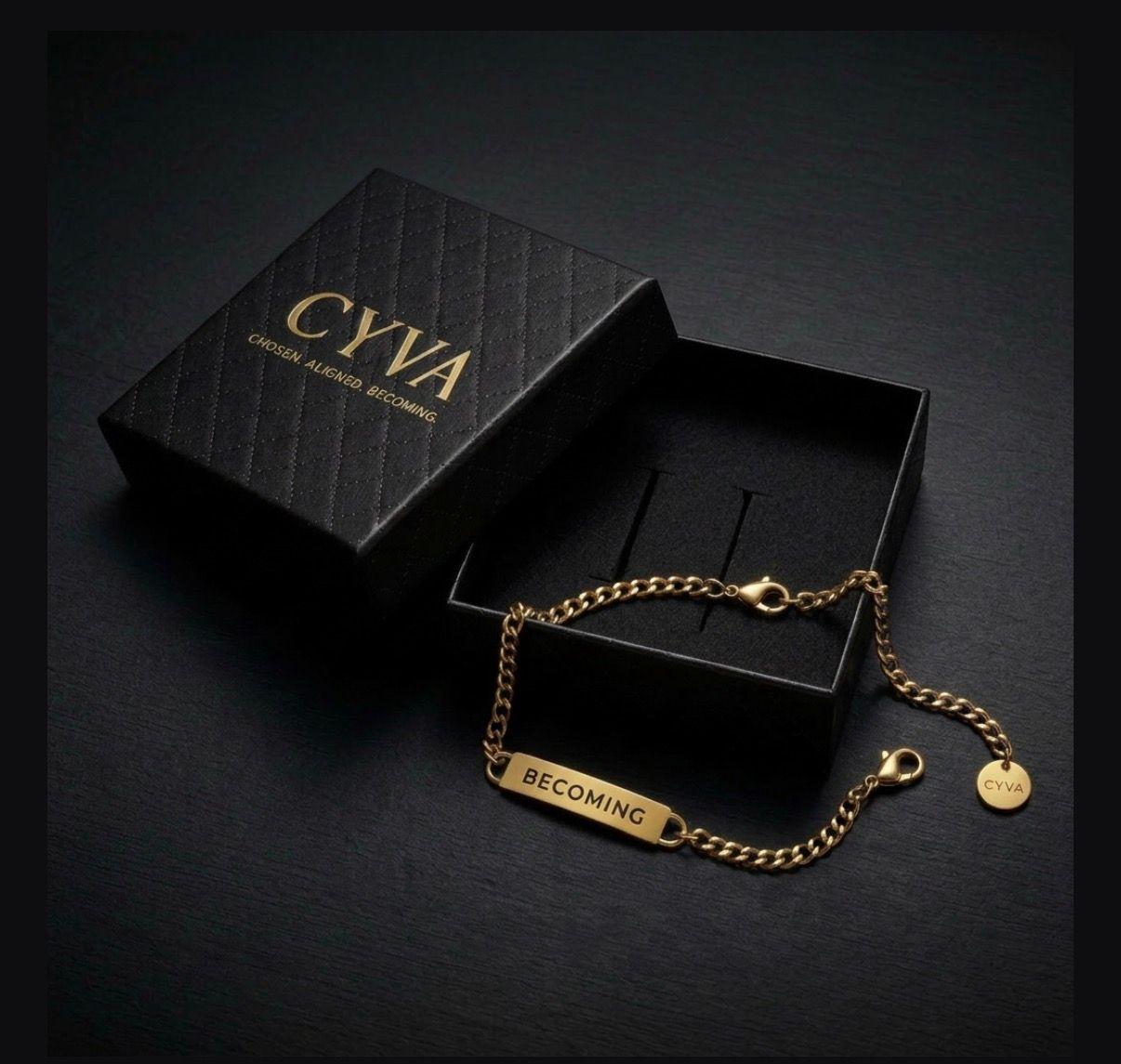 a black box with a gold chain attached to it