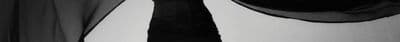 a black and white photo of a man's necktie