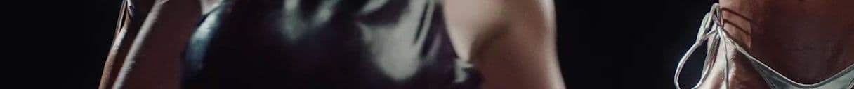 a close up of a vase with a black background