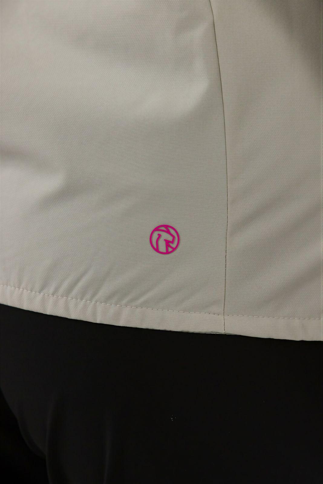 a close up of a person wearing a white jacket