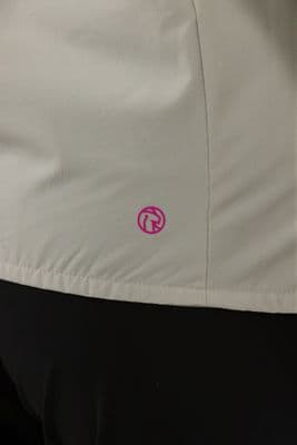 a close up of a person wearing a white jacket