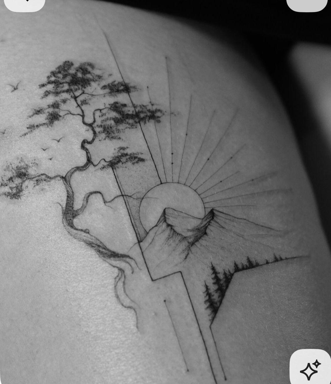 a black and white photo of a tattoo of a tree