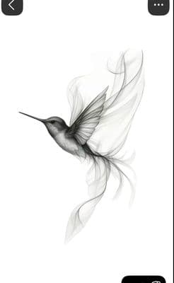 a black and white photo of a hummingbird