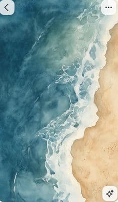 an iphone with a picture of a beach in the background