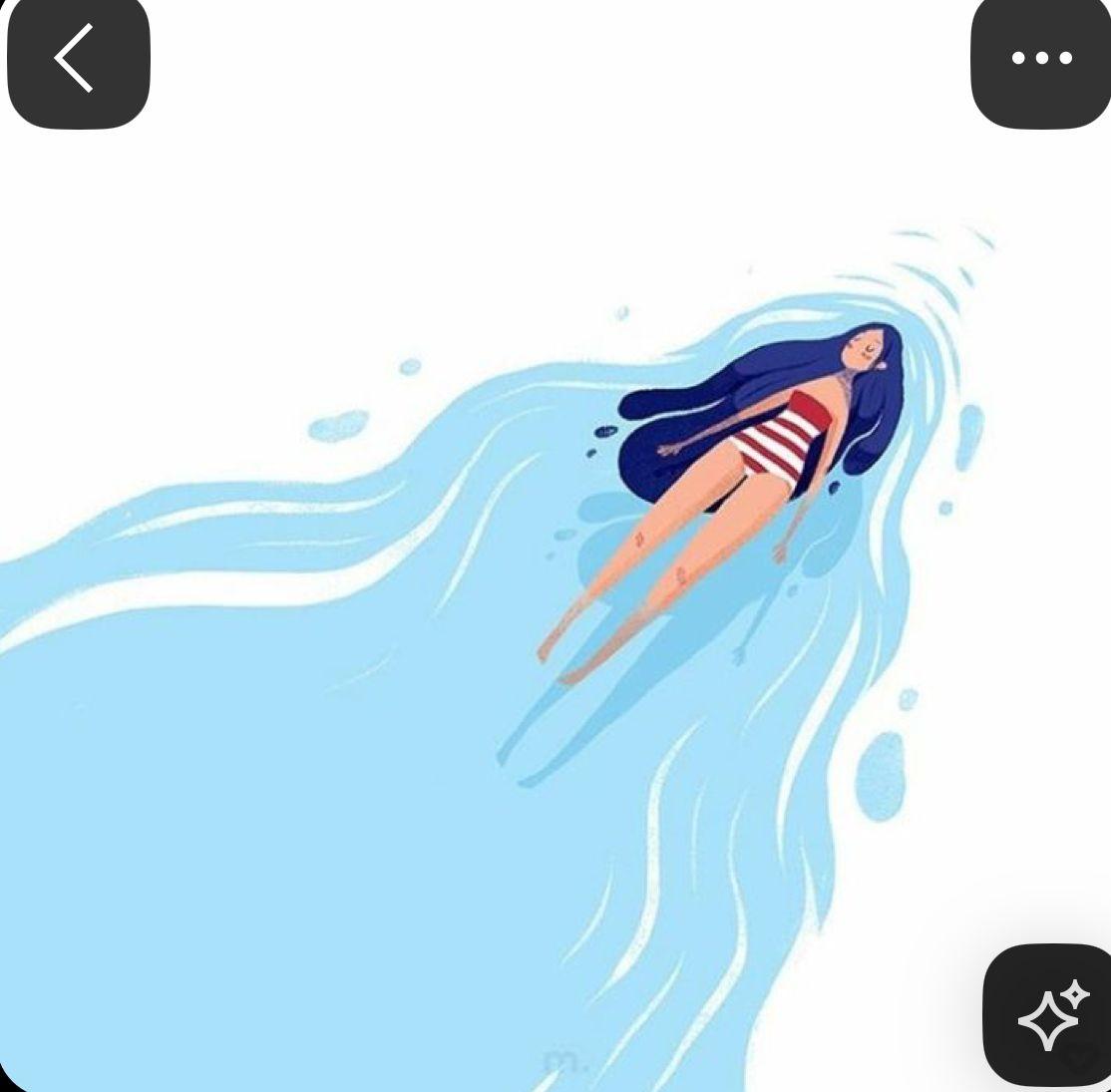 a woman floating on top of a body of water