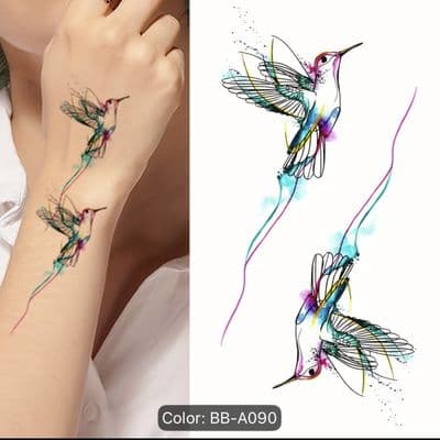 a woman with a tattoo of a hummingbird on her arm
