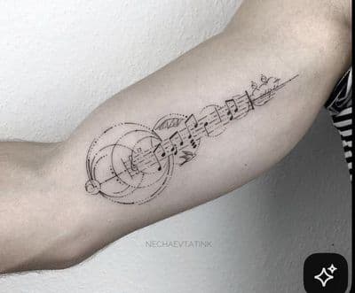 a person with a tattoo on their arm