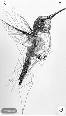 a black and white photo of a hummingbird