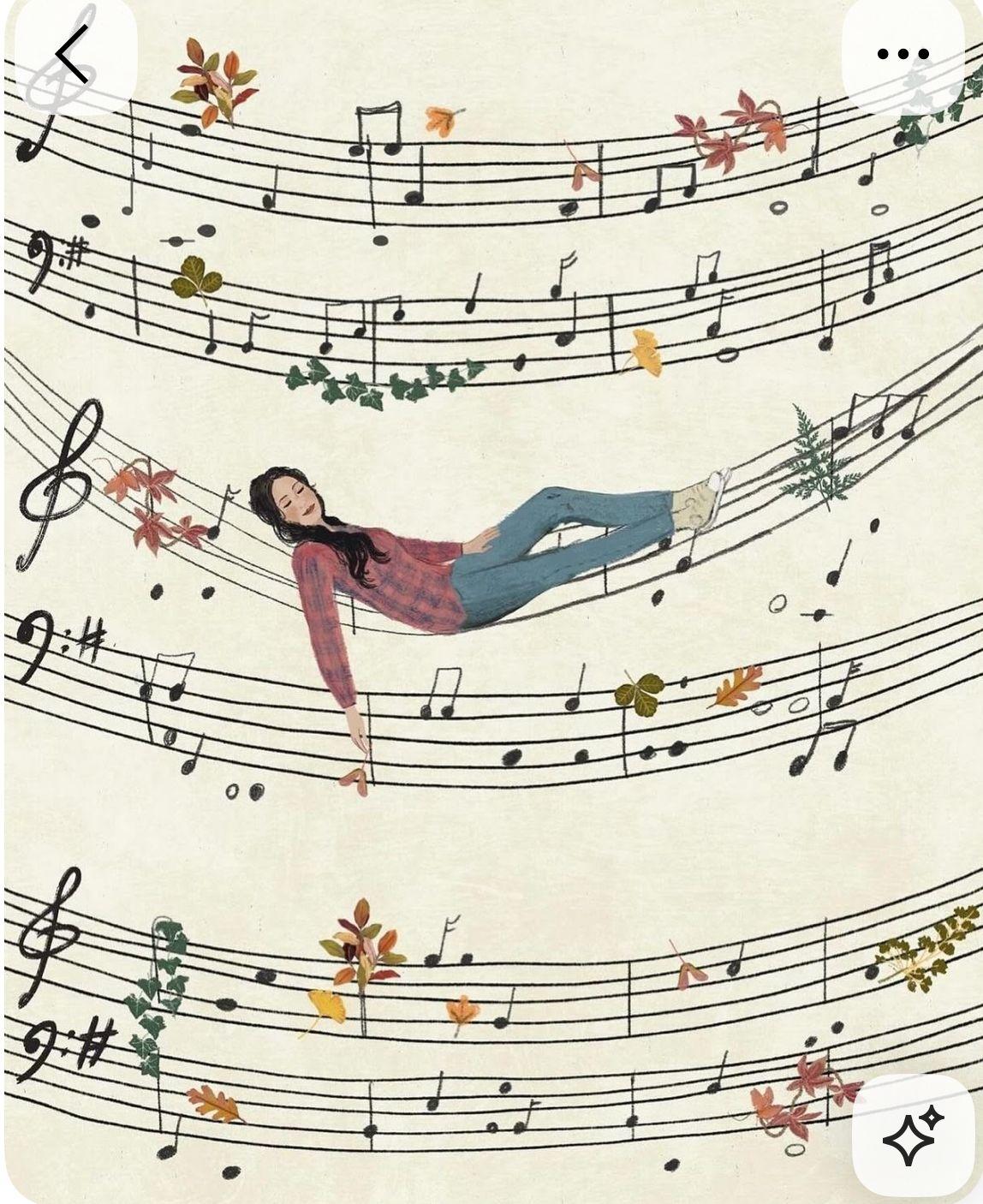 a woman laying on top of a sheet of music