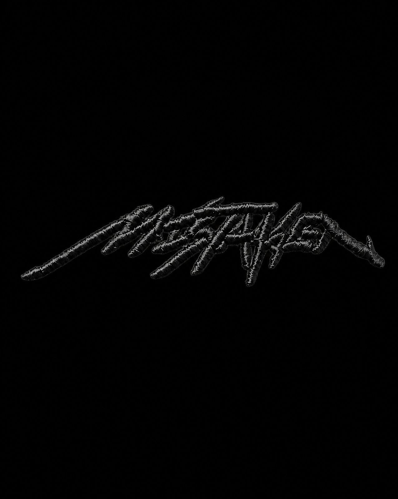 a black and white photo of a metal band logo