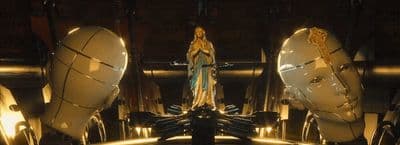 a statue of a woman standing in a room