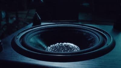 a close up of a speaker on a table