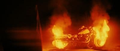 a motorcycle is on fire in the dark