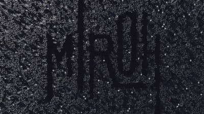a black and white photo with the word mom written on it