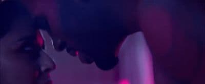 a man and a woman standing next to each other