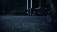a blurry photo of a person sitting on the ground
