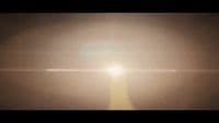 a blurry photo of the sun shining in the sky