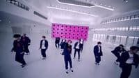 a group of people standing in a room