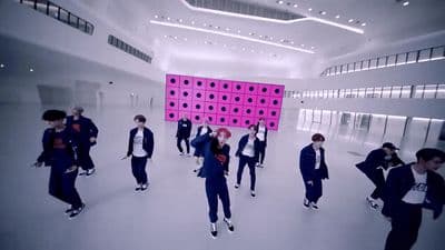 a group of people standing in a room