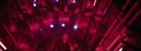 a large room with a lot of red lights