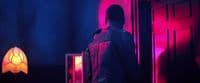 a person standing in front of a door