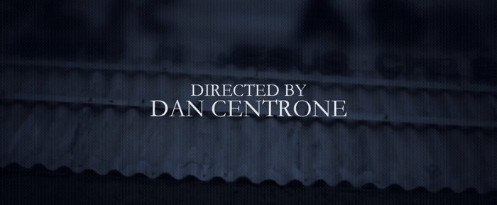 the words directed by dan centreone on a dark background
