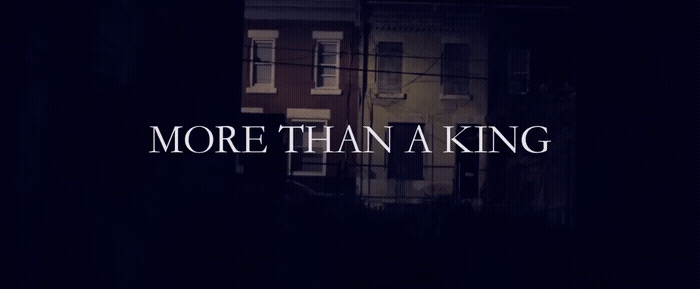 a dark picture with the words more than a king