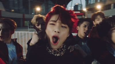 a group of people with their mouths open
