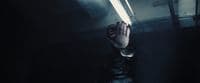 a person holding their hands up in the air