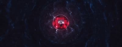 a red light in the middle of a dark tunnel