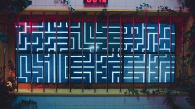 a building that has a sign on the side of it