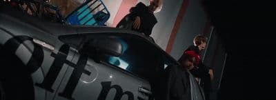 a police car parked in front of a building