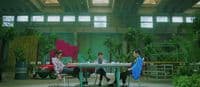 a group of people sitting around a table
