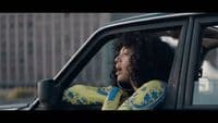 a woman sitting in the passenger seat of a car