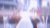 a blurry image of a woman walking down a street