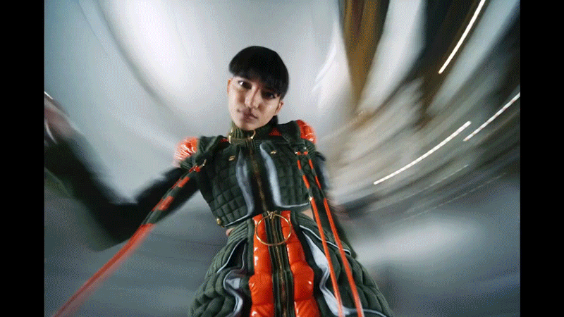 a man in a green and orange costume