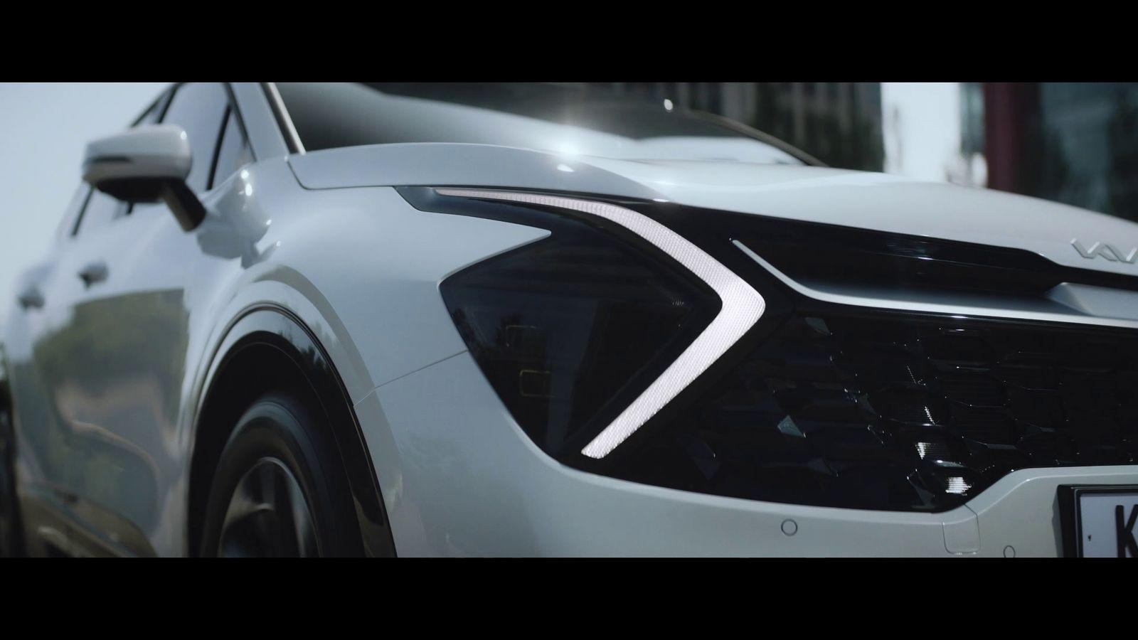 a close up of the front of a white car