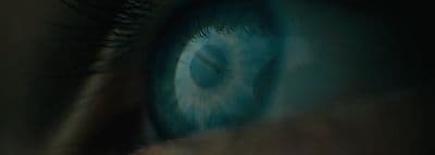 a close up of a person's blue eye