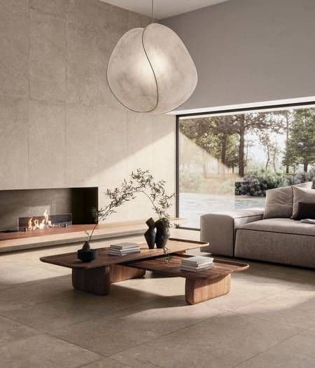 a living room filled with furniture and a fire place