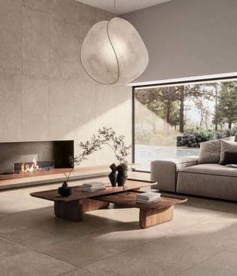 a living room filled with furniture and a fire place