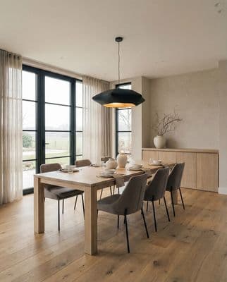 a dining room with a table and chairs