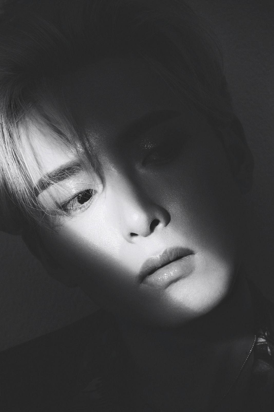 a black and white photo of a woman's face