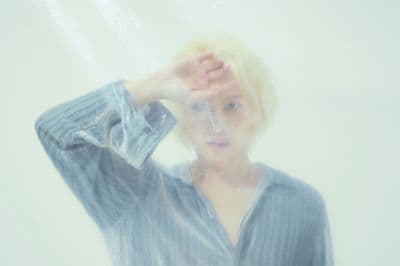 a blurry photo of a woman with blonde hair